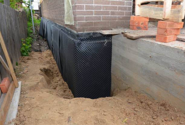 Happy homeowners after waterproofing job in Willingboro